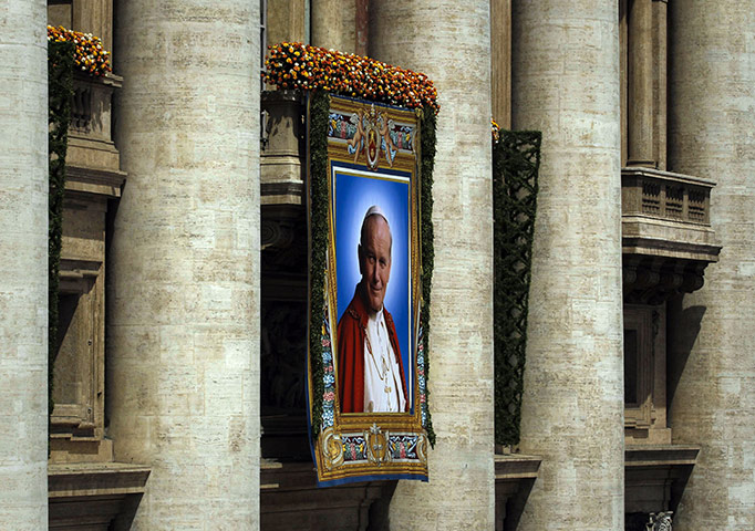 Beatification: A tapestry of John Paul II on the facade of St Peter's Basilica