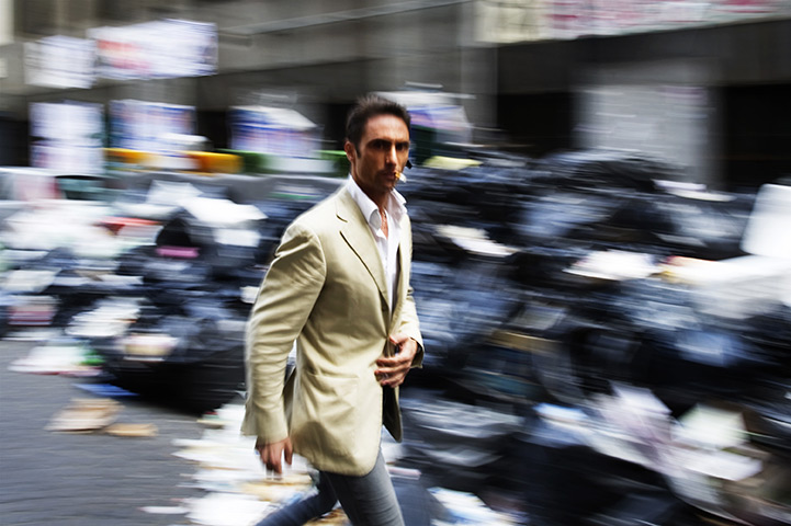 24 hours in pictures: uncollected rubbish lining a street in Naples