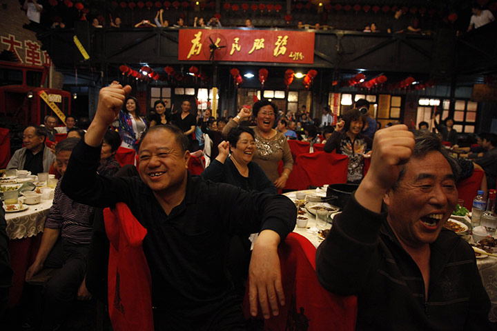 From the Agencies: Customers cheer at the Red Classic restaurant