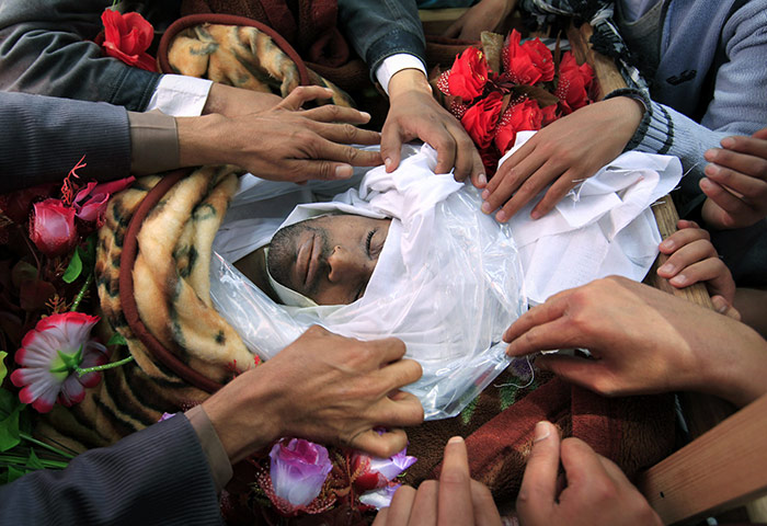 24 Hours: Protesters mourn a man killed during clashes with the police