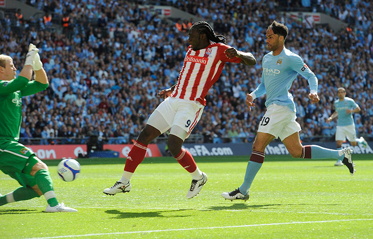 FA Cup Final City v Stoke: Kenwyne Jones has his shot saved by Joe Hart