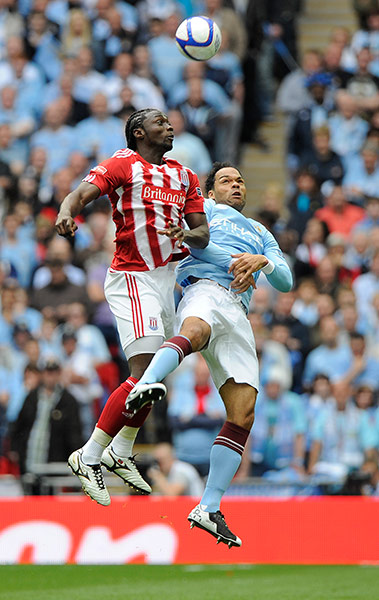 FA Cup Final City v Stoke: Kenwyne Jones rises highest to win a header against Joleon Lescott