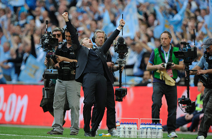 FA Cup Final City v Stoke: Roberto Mancini celebrates Manchester City's victory 