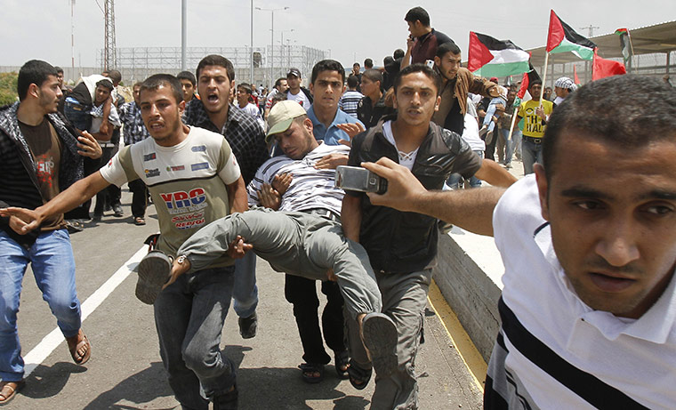 Israel violence: Wounded protester after Israeli troops opened fire near Erez 