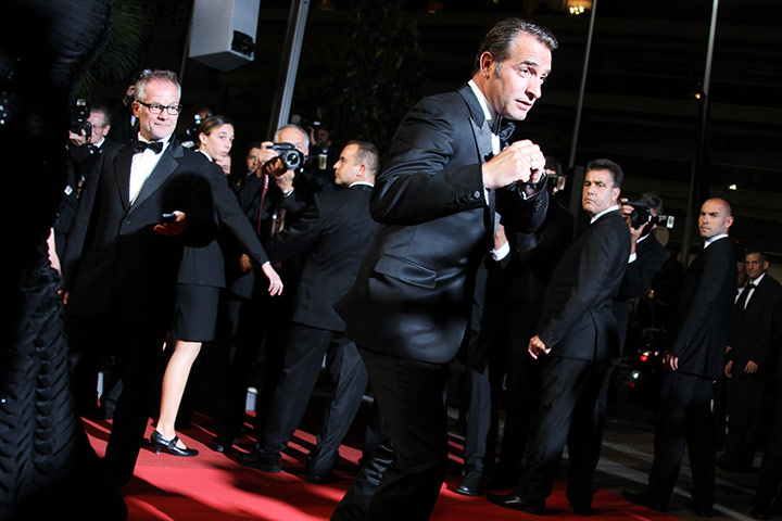 Cannes Festival 2011: French actor Jean Dujardin jokes on the red carpet 