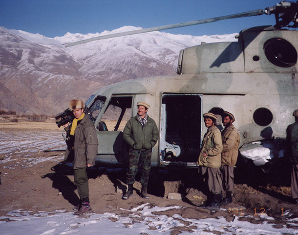 Rory Peck (left) and Peter Jouvenal hitch a lift on a Russian helicopter