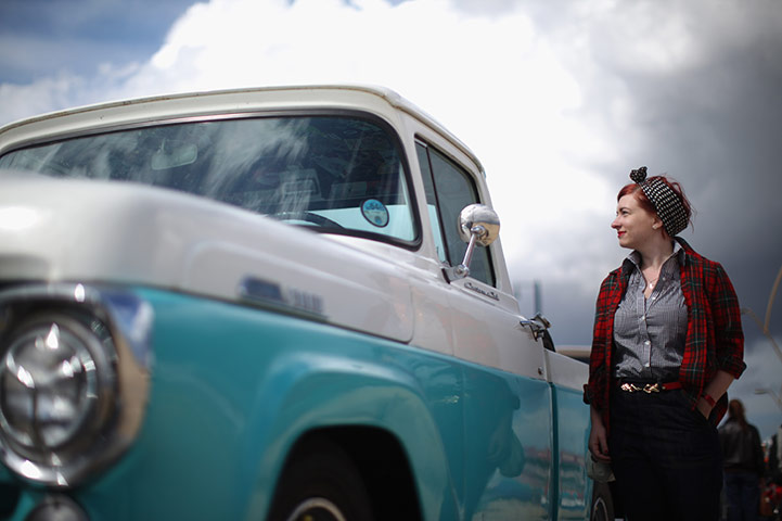 Rockabilly Weekender: A Rock and Roll devotee stands beside a car