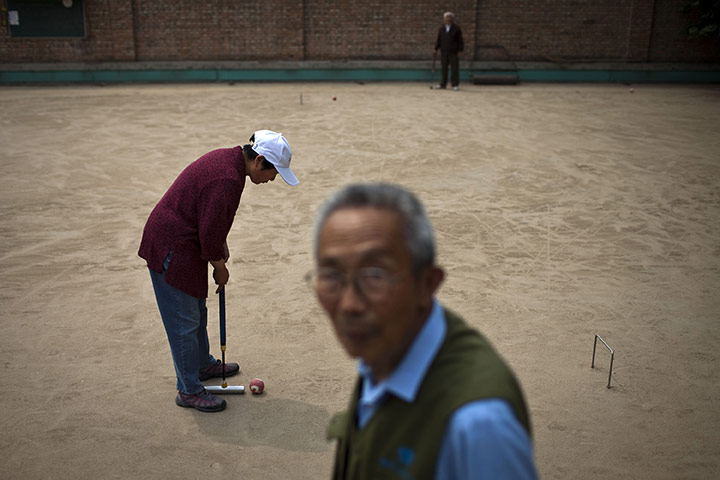 24 hours in pictures: Elderly people play gateball in Beijing, China
