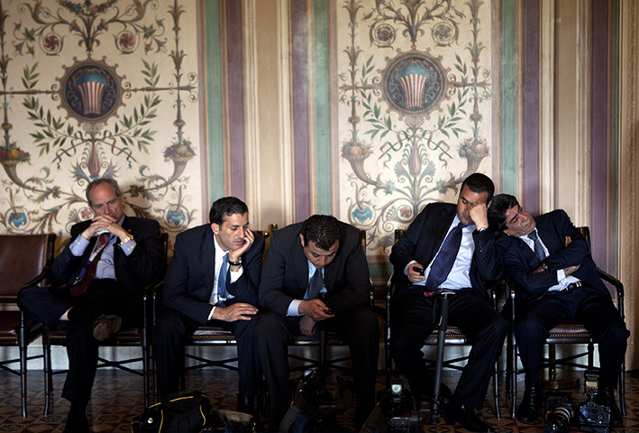 24 hours in pictures: Members of the Jordanian press  wait for a meeting in Capitol Hill
