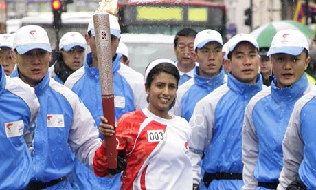 Konnie Huq carrying the Olympic torch in 2008