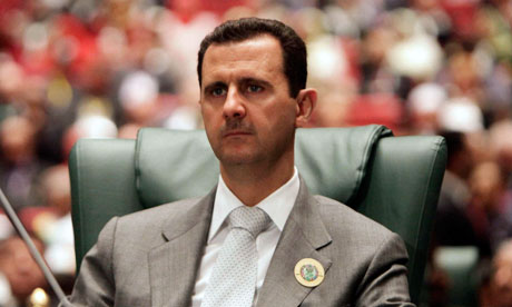 File picture of Syria's President Bashar al-Assad attending the Arab League summit in Sirte