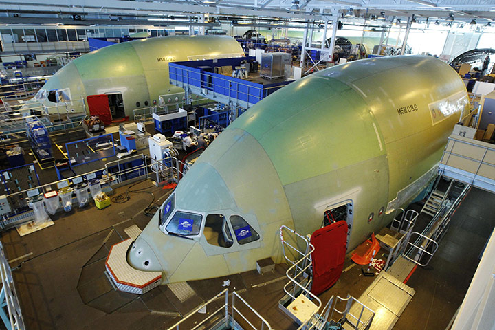Business Week: Employees working in the fuselage section of the A380 Airbus