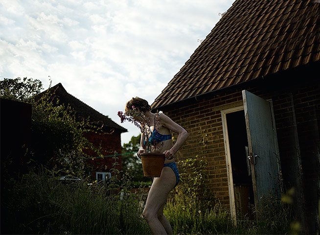 Léonie Hampton: Repotting her snap dragon, 2008