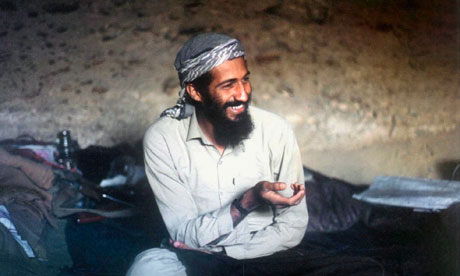 Saddam Hussein Osama Binladen. Osama Bin Laden, in a cave