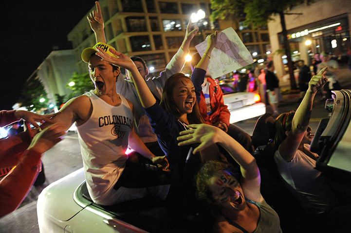 Bin Laden US reaction: Revellers celebrate as they drive near the White House in Washington