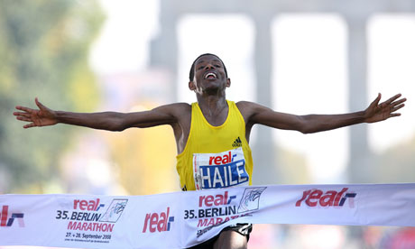 marathon runner crosses line