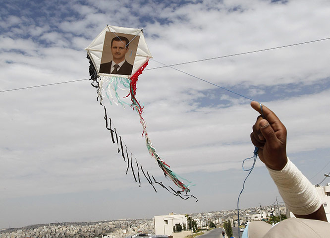 24 Hours in Pix: Flying a kite in Jordan