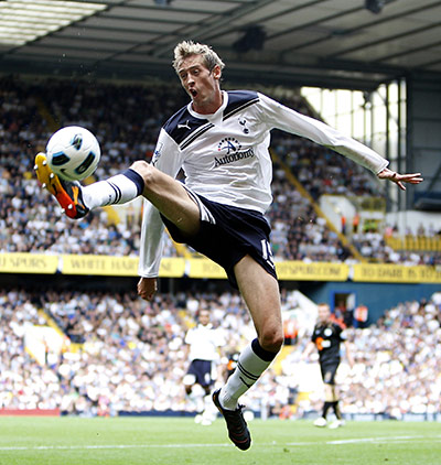 Premier League 2010-11: Tottenham Hotspur's Peter Crouch controls the ball 