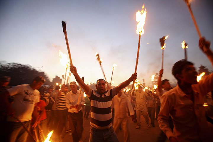 24 hours in pictures: ctivists in support of the indigenous Chhetri community  in Kathmandu
