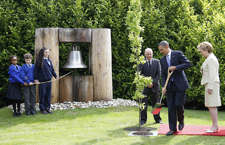 obama visits Ireland: Barack Obama plants a tree at the peace bell in Dublin