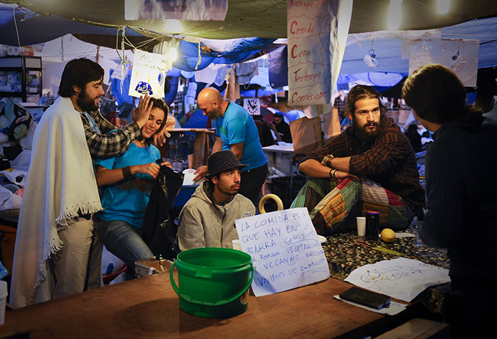 Spain protests continue: Protesters occupy the Puerta del Sol square