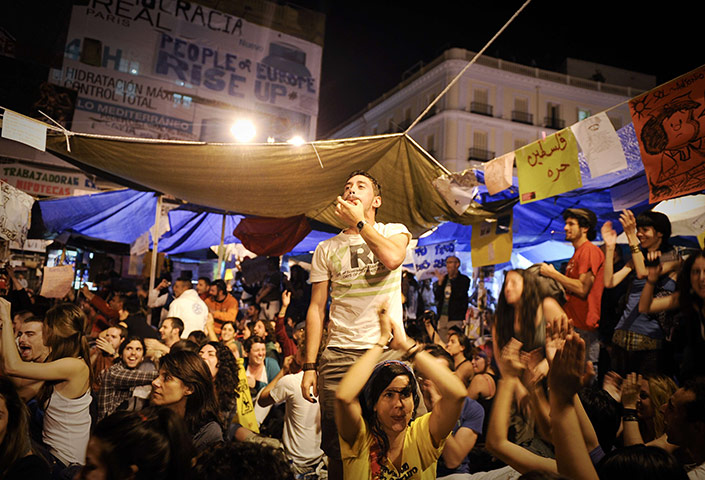 Spain protests continue: Protestors attend a demonstration through the night