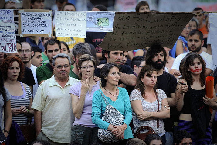 Spain protests continue: Protestors observe the demonstration, Spain