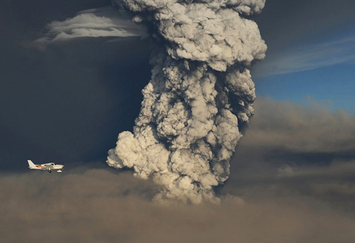 Grimsvotn volcano: A plane flies past the ash plume from the eruption of the Grimsvotn volcano