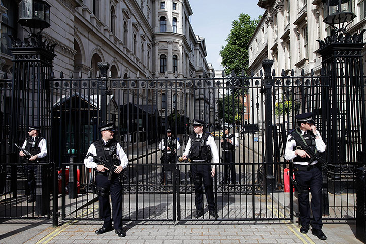 Obama UK visit: Armed police guard the entrance to Downing Street