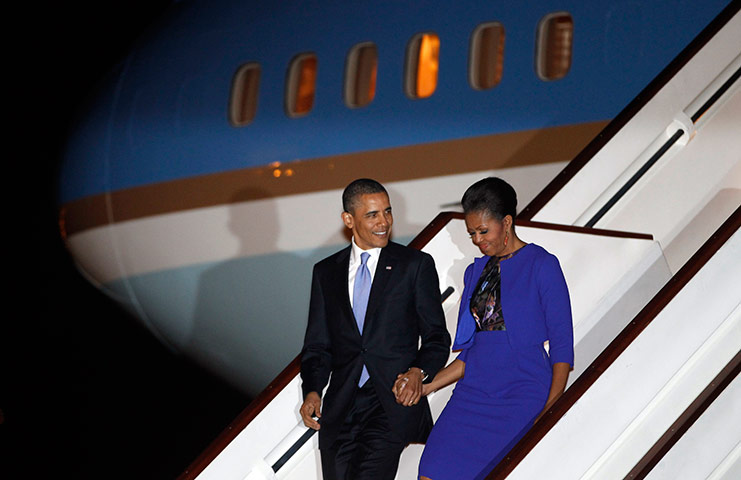 Obama UK visit: Barack Obama and Michelle Obama arrive at London's Stansted Airport