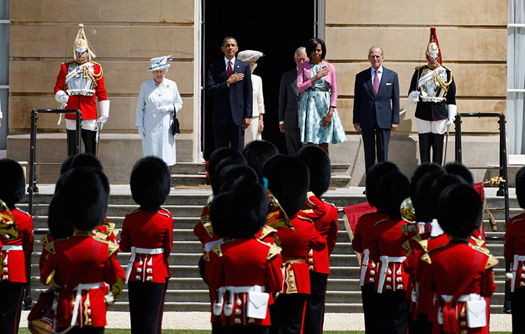 Obama visits UK: Barack and Michelle Obama listen to the US National Anthem