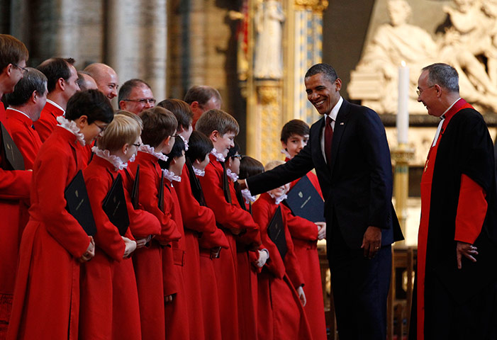 Obama visits UK: Barack Obama greets members of the choir at Westminster Abbey