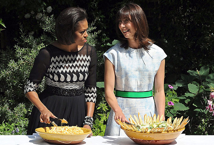 Obama UK visit update: Michelle Obama and Samantha Cameron serve food in the garden