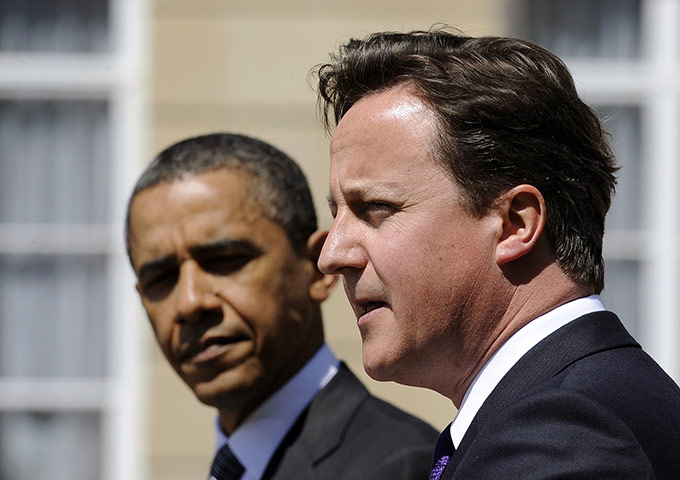 Obama UK visit update: Barack Obama listens as David Cameron speaks during joint press conference 