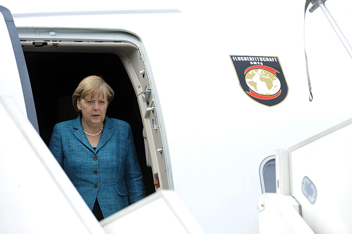 G8 summit: German Chancellor Angela Merkel disembarks from a plane