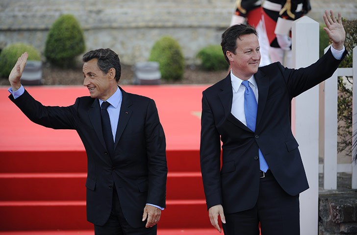G8 summit: Nicolas Sarkozy and David Cameron wave at the G8 summit in Deauville