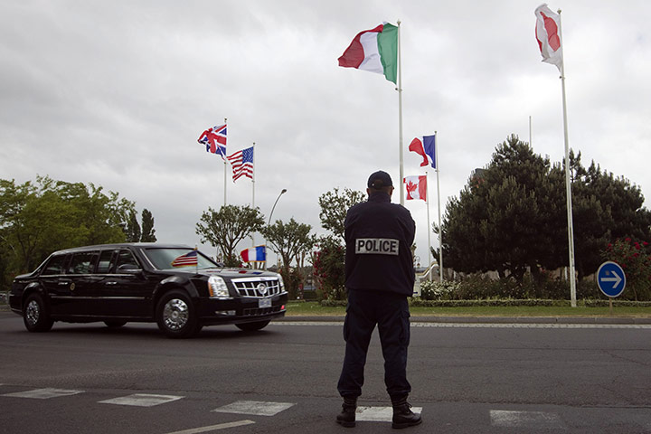 G8 summit: The limousine with US President Obama onboard drives through Trouville