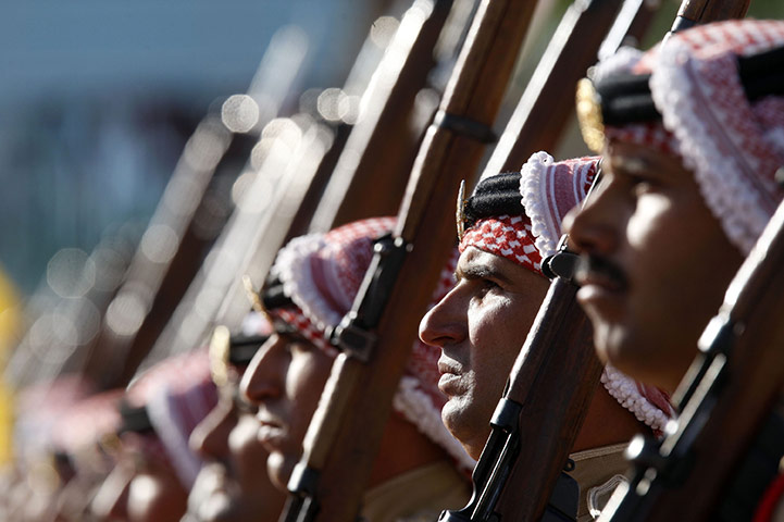 24 hours in pictures: Honour guards stand for the arrival of King Abdullah, Jordan