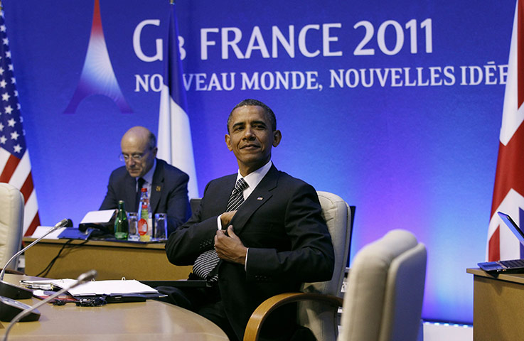 G8 summit: US President Barack Obama looks up at the start of first working session 