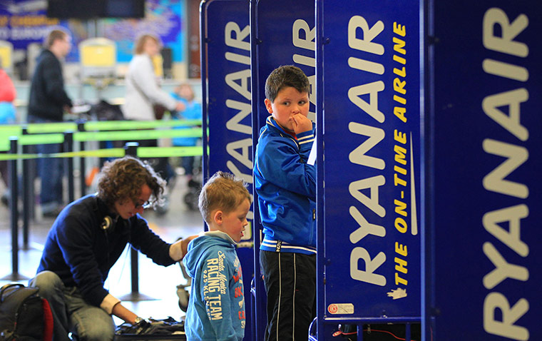 Week in Business: People queue at the Ryanair check-in desk at Dublin International airport 