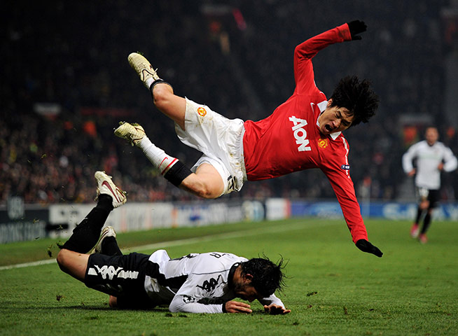 United's road to Wembley: Valencia's Ever Banega brings down Manchester United's Ji-Sung Park