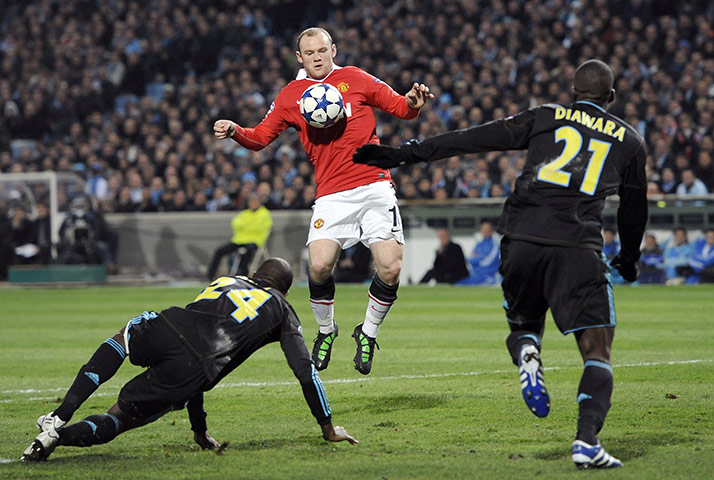 United's road to Wembley: Rooney skillfully controls the ball in front of Marseille defenders