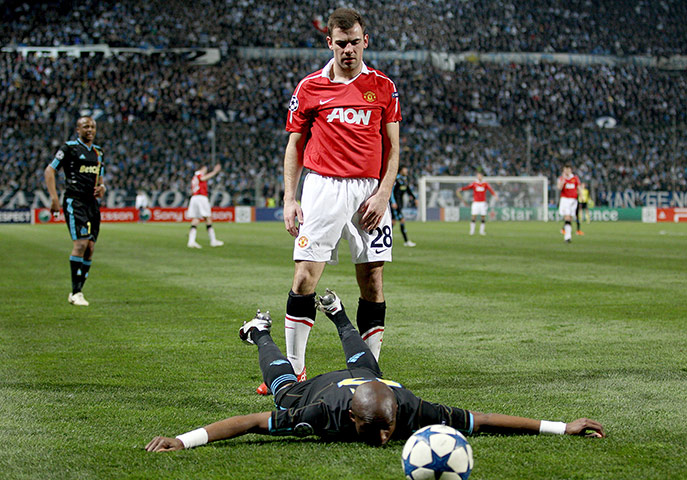 United's road to Wembley: There's a look of distain for Stephane M'Bia from Darron Gibson 