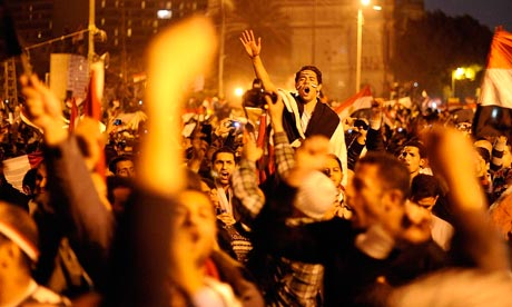 Egyptians celebrate the resignation of Hosni Mubarak in Tahrir Square