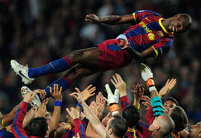 Barcelona: Barcelona's players toss teammate Barcel