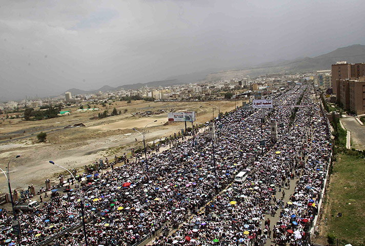 Middle East Unrest: Anti-government protesters attend weekly Friday prayers during a rally