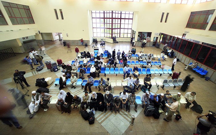 Egypt Gaza border: Palestinians wait in the Egyptian passport administration hall