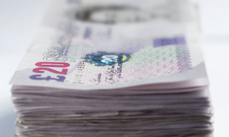 pile of twenty pound notes