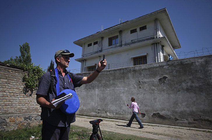 Pakistan : Journalists work outside the compound where Osama bin Laden was killed