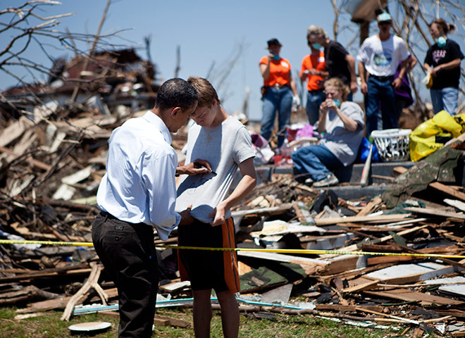 Obama in Joplin: Barack Obama signs a boy's T-shirt, Joplin